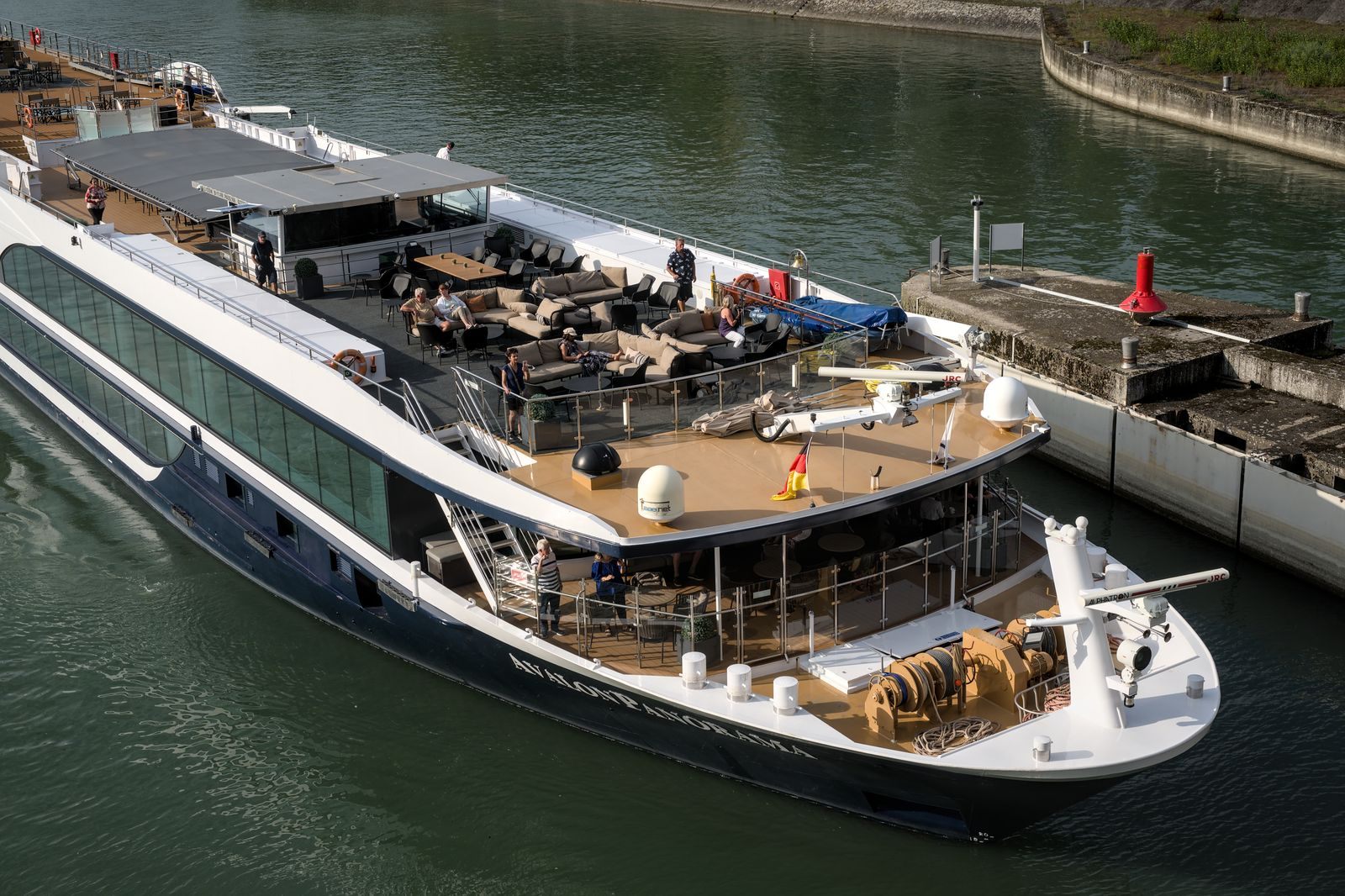 Sun deck and lounge terrace of a modern river cruise ship, an example of the best river cruising boats