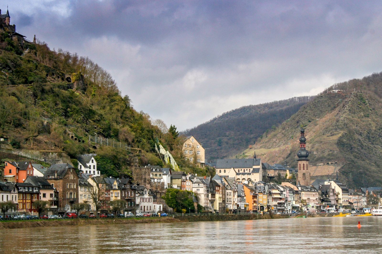 Cochem riverfront with its castle and church on the Moselle in Germany